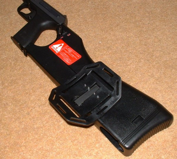 Stock, fitted with belt clip, is included in package.